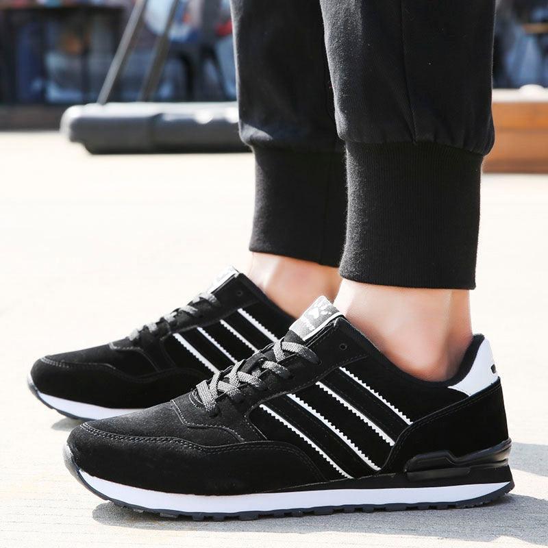 Men's black suede sneakers with three white stripes and lace-up casual trainers on Tampa Home & Garden Store