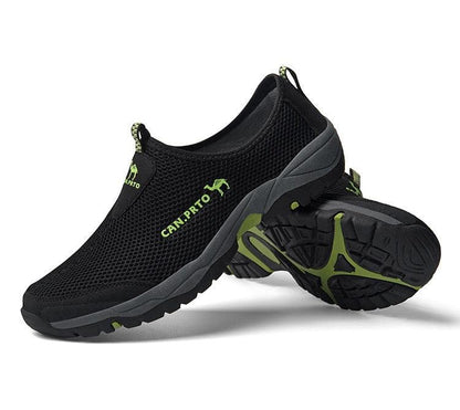 Stevvex black mesh slip-on sneakers with lime green accents and rugged outsole on Tampa Home & Garden Store