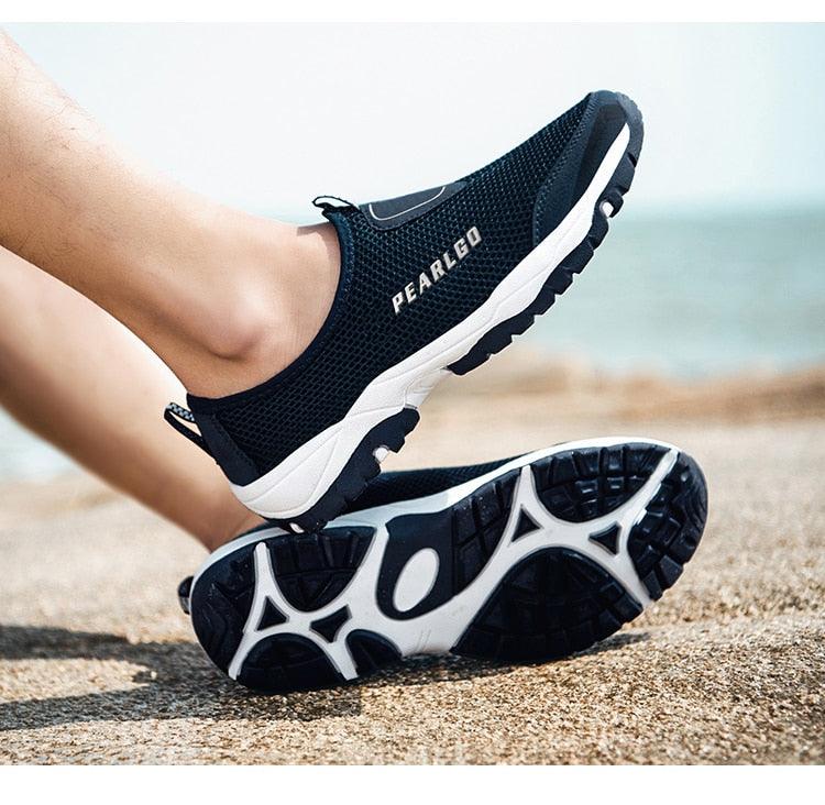 Stevvex black mesh slip-on sneakers with white sole, breathable non-slip outsole on Tampa Home & Garden Store