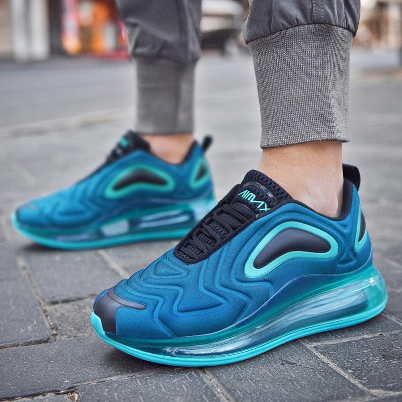 Stevvex athletic shoes pair in teal blue breathable mesh with air cushion sole on Tampa Home & Garden Store