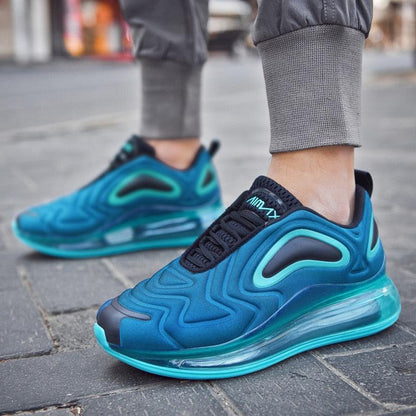 Stevvex athletic shoes pair in teal blue breathable mesh with air cushion sole on Tampa Home & Garden Store