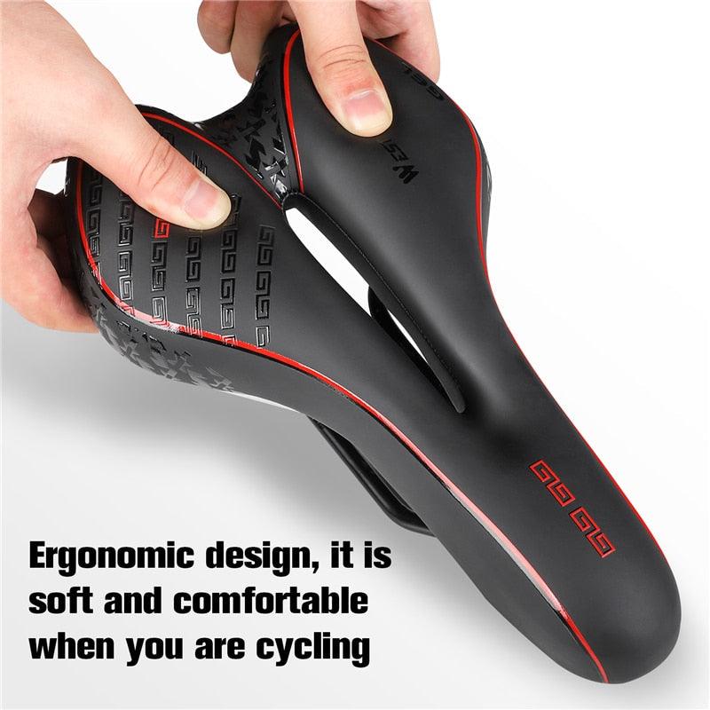 Stevvex leather bike saddle with hollow center, black with red trim, ergonomic road bike seat on Tampa Home & Garden Store