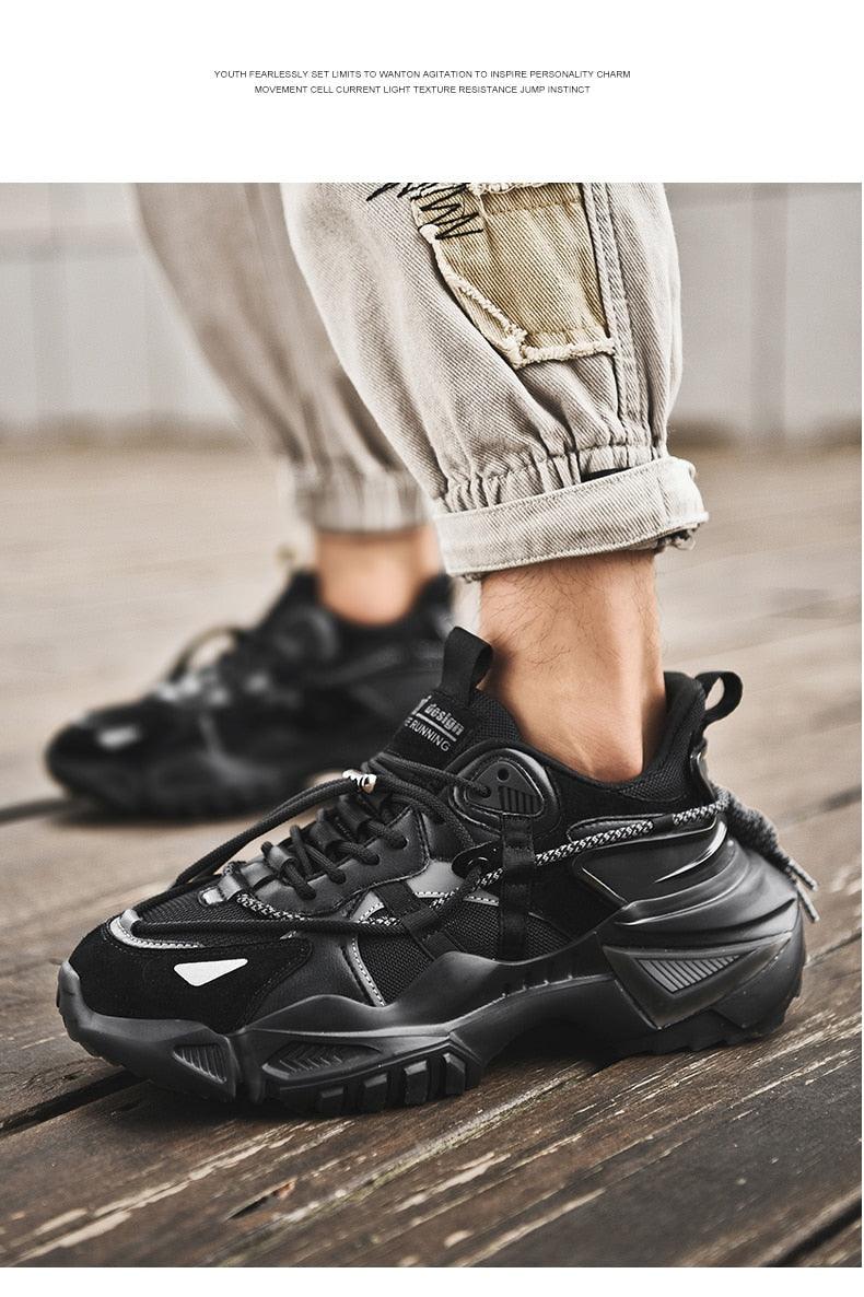 Men's Stevvex black chunky sneakers with thick elevated sole and rugged multi-material upper on Tampa Home & Garden Store