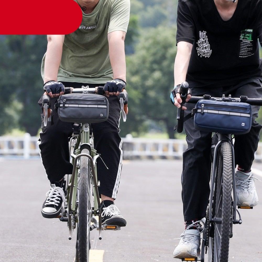 Waterproof Stevvex handlebar bag for bicycle frame, gray left and navy right, on two bikes on Tampa Home & Garden Store