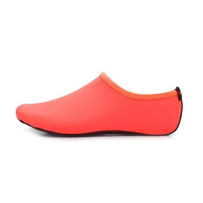Stevvex barefoot water shoe coral pink slip-on aqua sock with black sole on Tampa Home & Garden Store