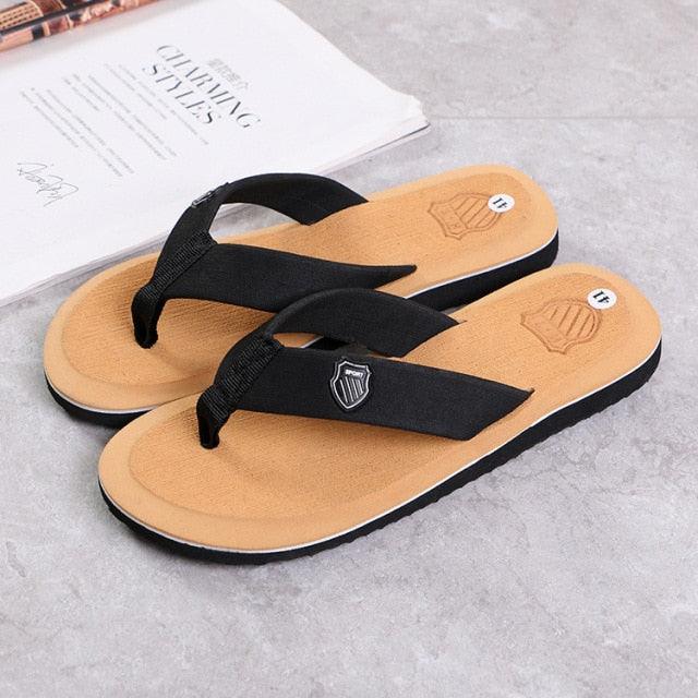 Stevvex men's flip flops black thong sandals with tan footbed arch support on Tampa Home & Garden Store
