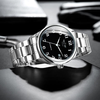 Stevvex automatic men's watch with silver stainless steel bracelet, black dial, date window on Tampa Home & Garden Store