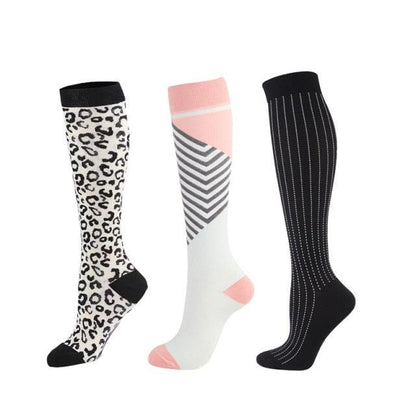 Stevvex athletic compression socks leopard print, pink geometric, black pinstripe knee-highs on Tampa Home & Garden Store