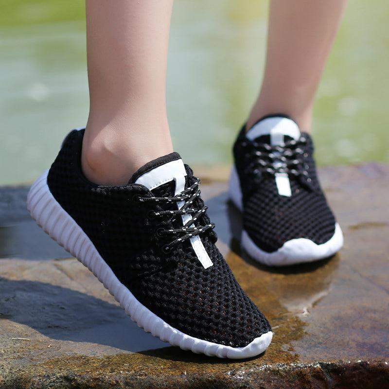 Stevvex women's black mesh athletic sneakers with lace-up and white sole breathable on Tampa Home & Garden Store