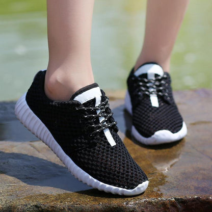 Stevvex women's black mesh athletic sneakers with lace-up and white sole breathable on Tampa Home & Garden Store