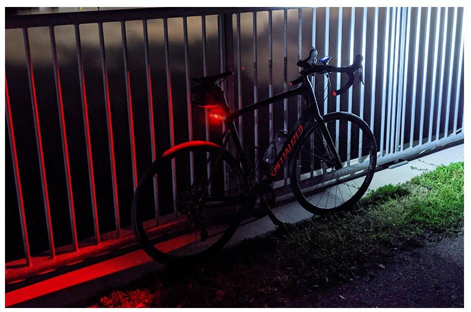 Stevvex waterproof LED bike light and USB flashlight on black road bike with red light on Tampa Home & Garden Store