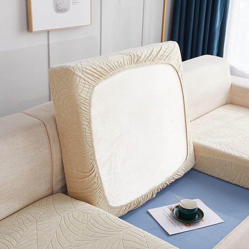 Stevvex waterproof sofa seat cover with beige leaf-pattern border, reversible cushion protector on Tampa Home & Garden Store