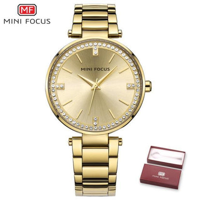 Gold-tone Mini Focus women's quartz watch with crystal bezel and stainless steel bracelet, box on Tampa Home & Garden Store