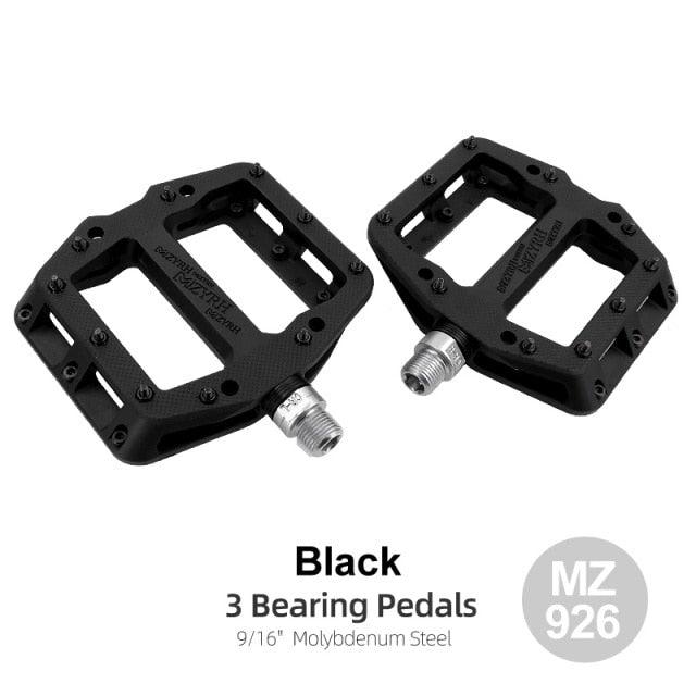 Black flat platform bicycle pedals with silver axles, 9/16 inch molybdenum steel, pair on Tampa Home & Garden Store