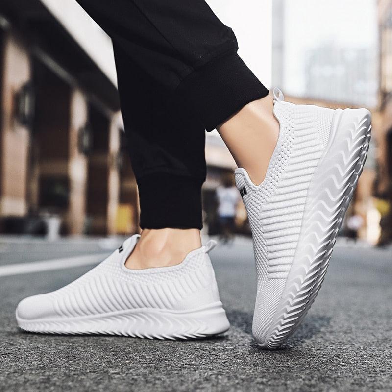 White knit slip-on sneakers with textured upper and cushioned sole for daily walking on Tampa Home & Garden Store