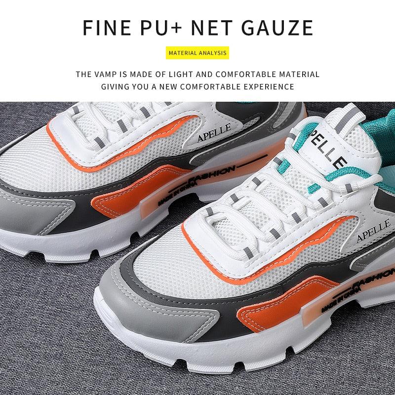 Stevvex athletic shoes pair with white mesh upper, orange gray overlays on Tampa Home & Garden Store