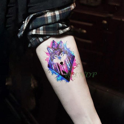 Stevvex temporary tattoo fox head in a colorful watercolor diamond frame on forearm on Tampa Home & Garden Store