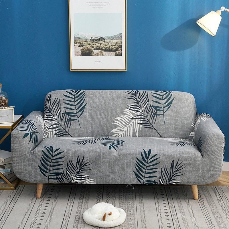 Stevvex elastic sofa cover for living room in grey with blue palm leaf print on a loveseat on Tampa Home & Garden Store