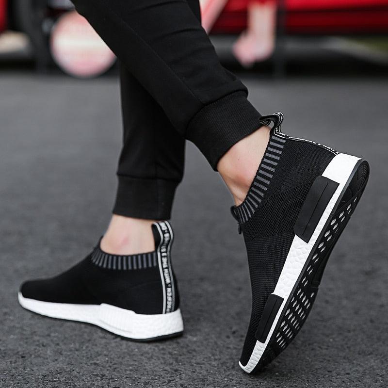 Stevvex men's black breathable knit sneakers with white cushioned sole and sock collar on Tampa Home & Garden Store