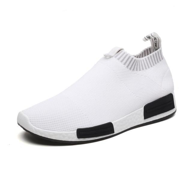 Stevvex men's white mesh slip-on running sneakers with knit upper and black side accents on Tampa Home & Garden Store