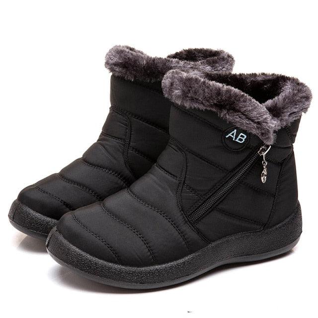 Stevvex black waterproof snow boots with faux fur lining and side zip on Tampa Home & Garden Store