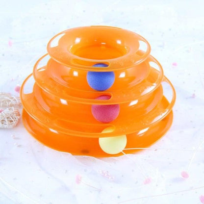Orange triple-disc cat toy with stacked rings and balls for kitten exercise on Tampa Home & Garden Store