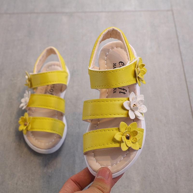 Stevvex girls' yellow strappy sandals with open toes and flower accents on three straps on Tampa Home & Garden Store