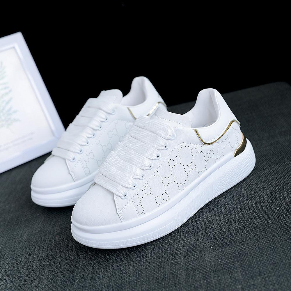 White women's sneakers with thick platform sole, lace-up, decorative side pattern, gold heel on Tampa Home & Garden Store