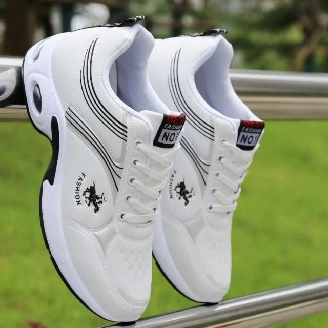 Men's white leather sneakers by Stevvex, lace-up casual fashion sneakers pair on Tampa Home & Garden Store