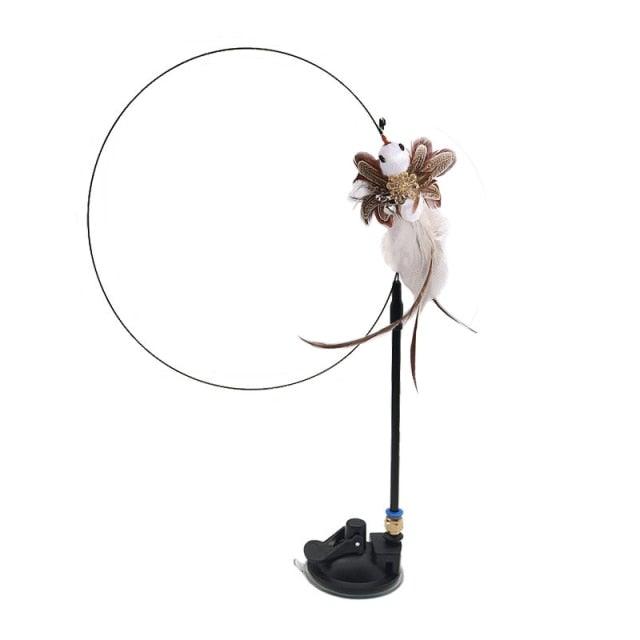 Stevvex cat teaser wand on stand with large circular hoop and feathered bird ornament on Tampa Home & Garden Store
