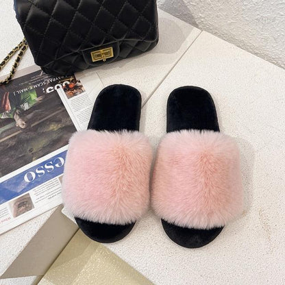 Stevvex pink fluffy faux fur slippers with black sole, open-toe indoor slides on Tampa Home & Garden Store