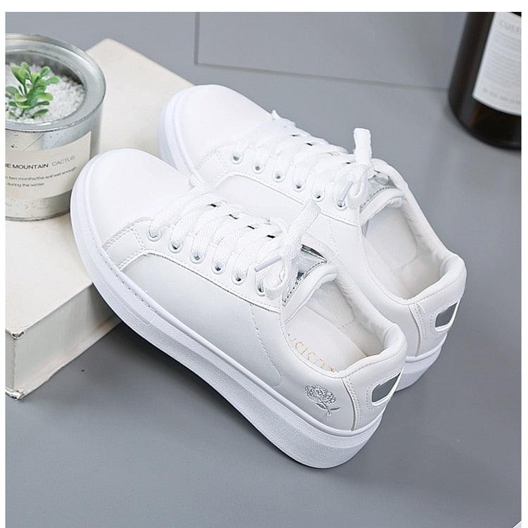 White leather lace-up sneakers with embroidered flower detail Stevvex low-top casual sneakers on Tampa Home & Garden Store