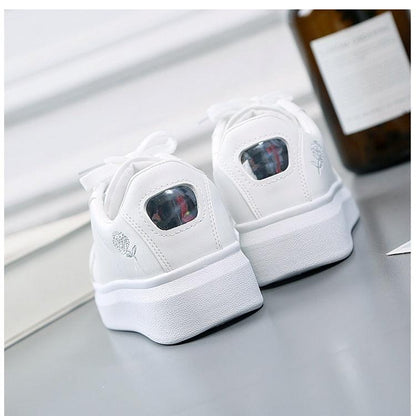 Women’s white Stevvex sneakers with embroidered flower, lace-up low-top pair on Tampa Home & Garden Store