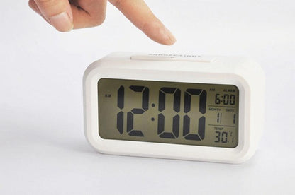 Stevvex digital alarm clock with large LCD display and white plastic body for desk or shelf on Tampa Home & Garden Store