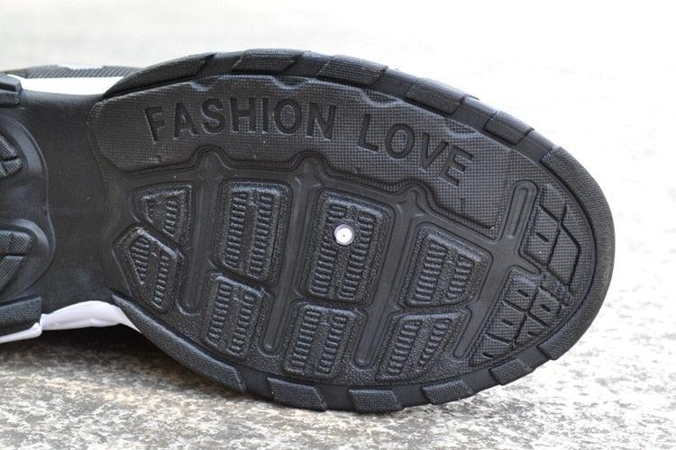 Stevvex athletic shoes with rugged black outsole and bold tread patterns on Tampa Home & Garden Store