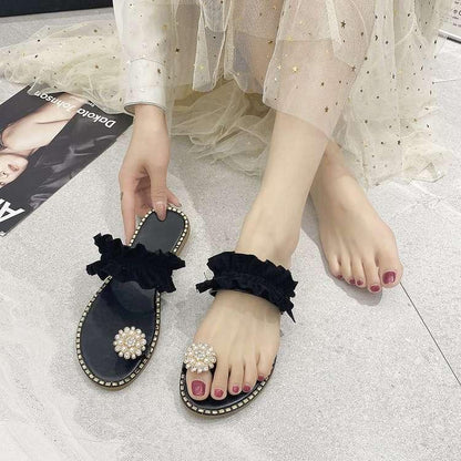 Women Sandals Stevvex black with open toe, pearl flower embellishment, and ruffled strap on Tampa Home & Garden Store