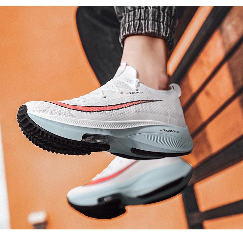 Stevvex white men's running sneakers with red stripe, light blue midsole, black outsole on Tampa Home & Garden Store
