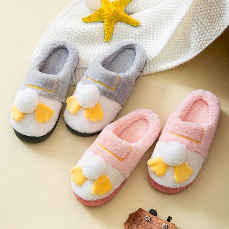 Slippers for couples plush pink and gray with white fluff and yellow bow accents, non-slip soles on Tampa Home & Garden Store