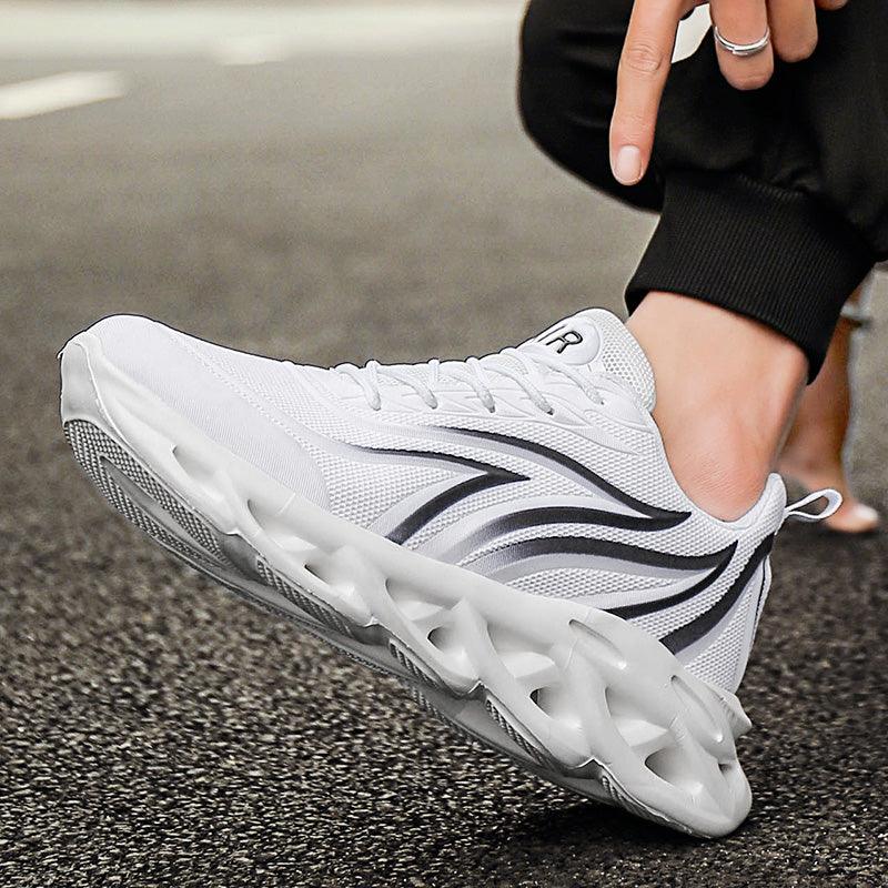White Stevvex athletic running shoe with black wave side stripes, breathable mesh upper on Tampa Home & Garden Store