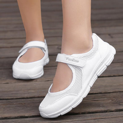 White Stevvex women sneakers with breathable mesh upper and Velcro strap pair on Tampa Home & Garden Store
