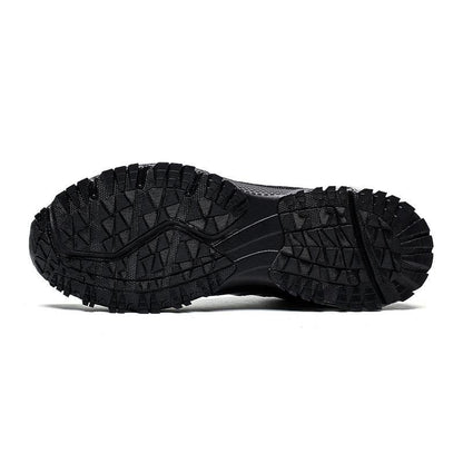 Men's running shoes outsole view with rugged black lug tread on Tampa Home & Garden Store