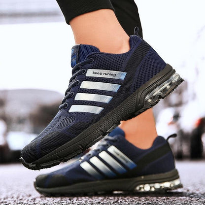 Stevvex men's navy running sneakers with breathable knit upper, lace-up, air cushion sole pair on Tampa Home & Garden Store