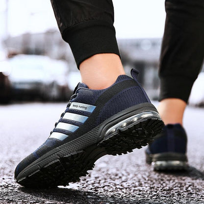 Stevvex navy blue running sneakers with breathable mesh lace-up and air cushion sole pair on Tampa Home & Garden Store