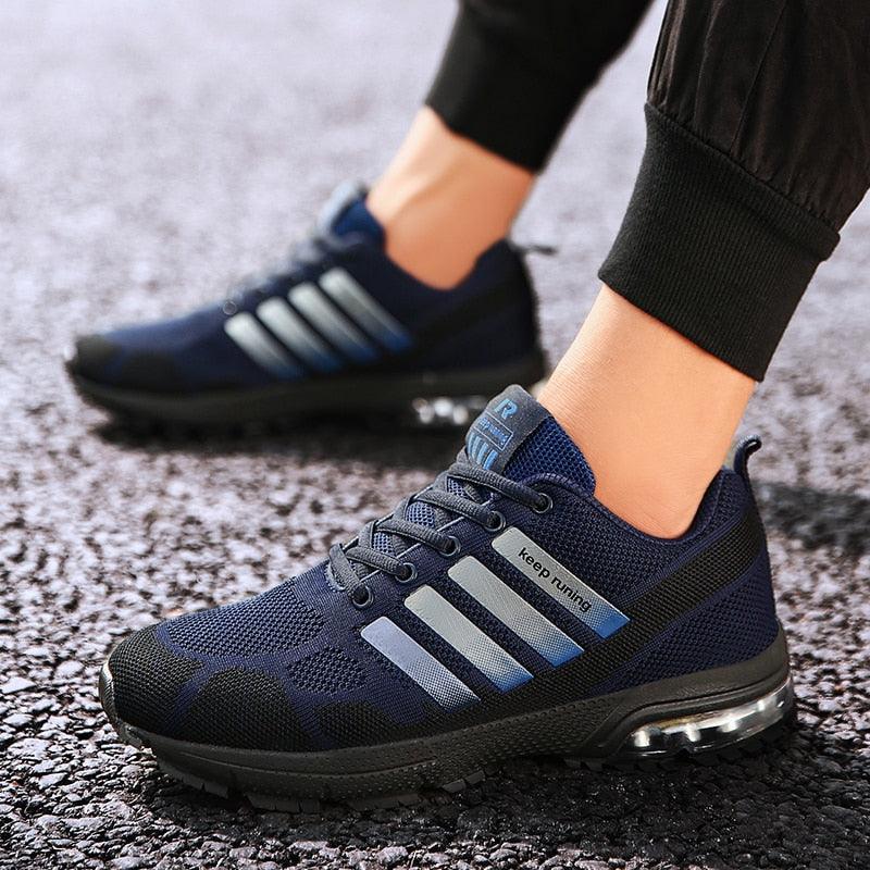 Stevvex navy mesh running sneaker with light gray three-stripe accents and air-cushion sole on Tampa Home & Garden Store