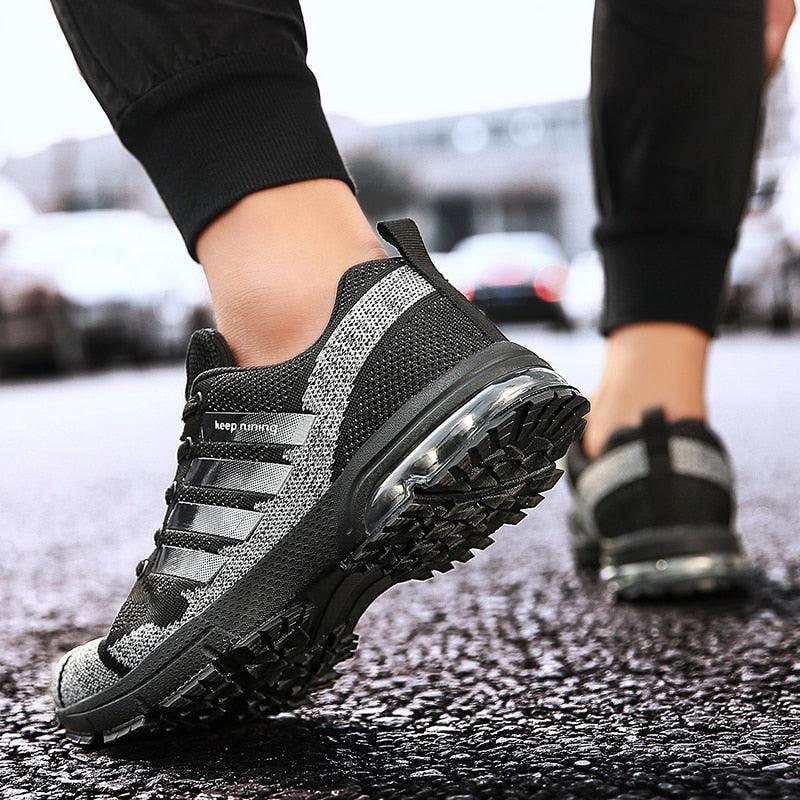 Stevvex running sneakers, black and gray knit upper with lace-up, air-cushioned rugged outsole on Tampa Home & Garden Store
