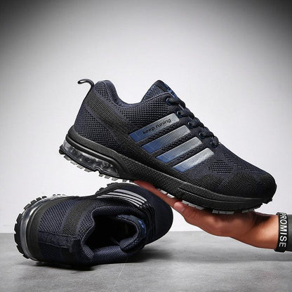 Stevvex running sneakers, dark navy knit upper with blue side stripes and aircushioned sole on Tampa Home & Garden Store