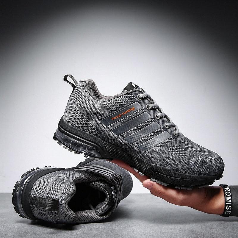 Stevvex running sneakers, grey knit upper, lace-up low-top athletic shoes, 2 shoes on Tampa Home & Garden Store