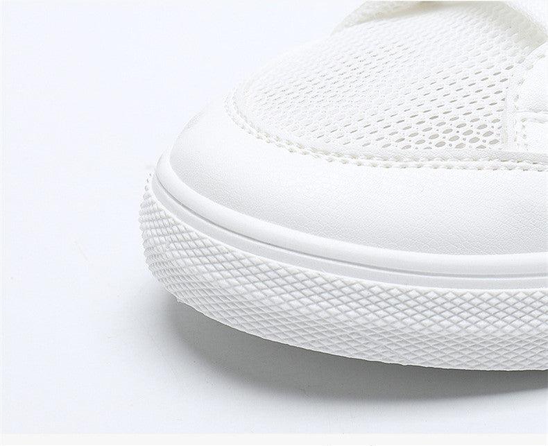 Women's white mesh sneakers with breathable upper and chunky textured sole on Tampa Home & Garden Store