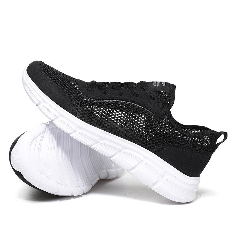 Men's black mesh sneakers by Stevvex with breathable upper and white sole on Tampa Home & Garden Store