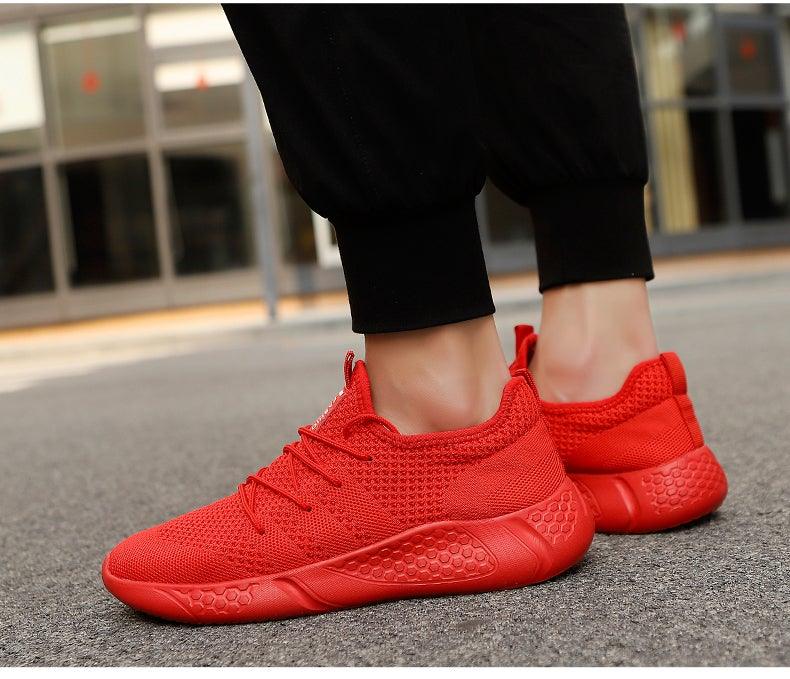 Stevvex red mesh sneakers with breathable knit upper and honeycomb sole on Tampa Home & Garden Store